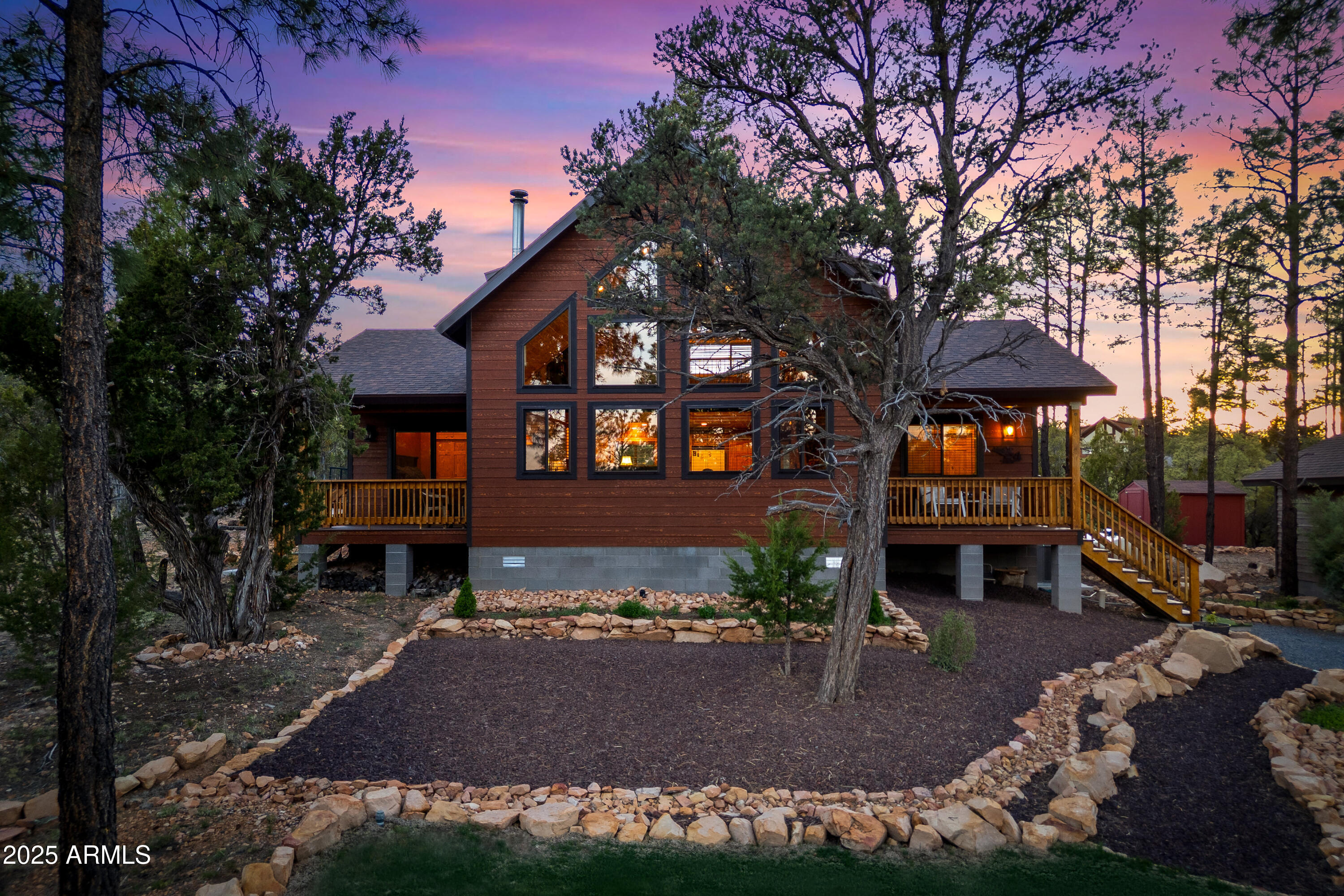 3334 Sawmill Ridge Loop Heber, AZ 85928 - Photo 45 of 58 a front view of a house with a yard