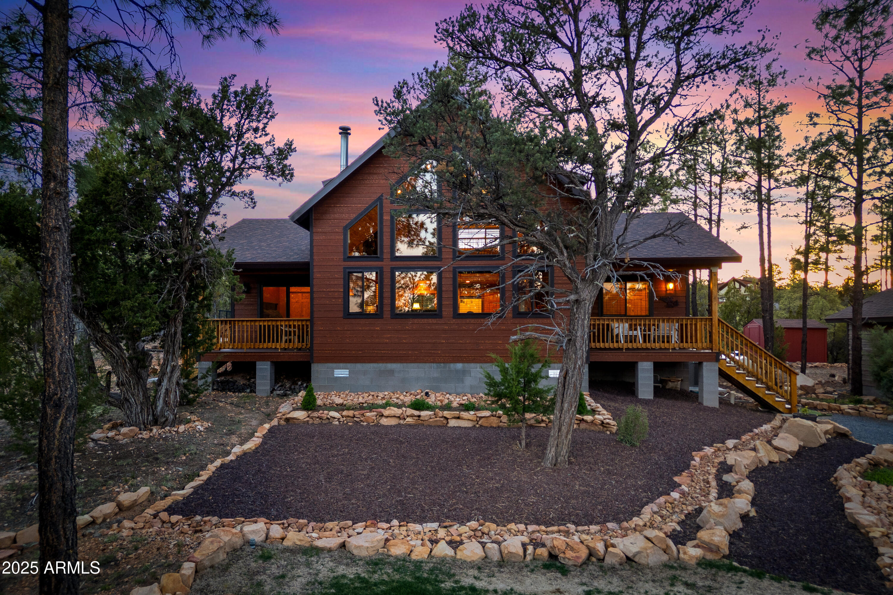 3334 Sawmill Ridge Loop Heber, AZ 85928 - Photo 48 of 58 a front view of a house with a yard