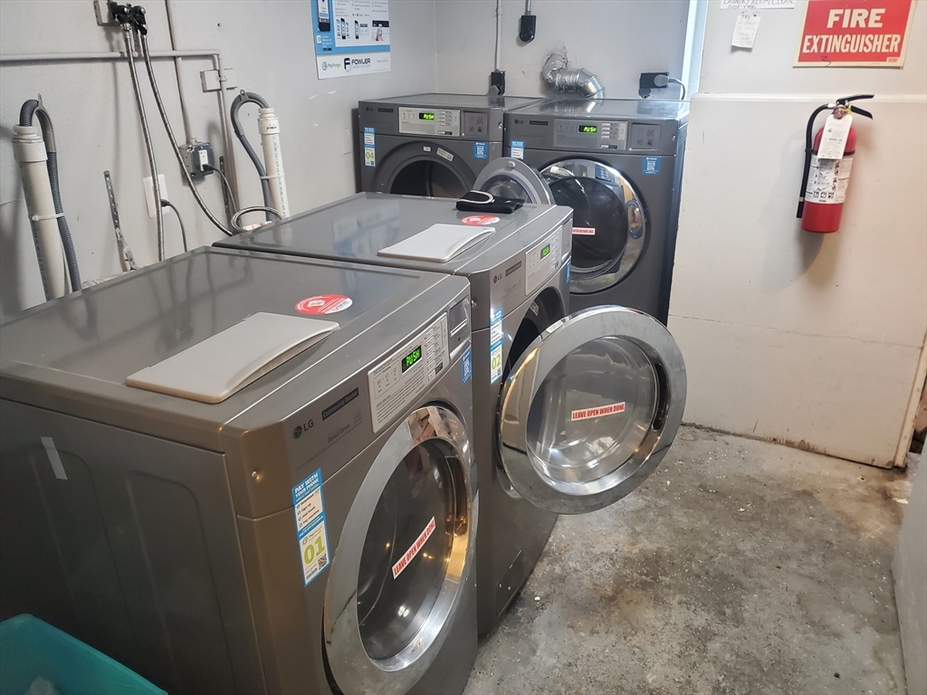 24 Colgate Road, Unit 5 Boston, MA 02131 - Photo 10 of 13 a utility room with dryer and washer