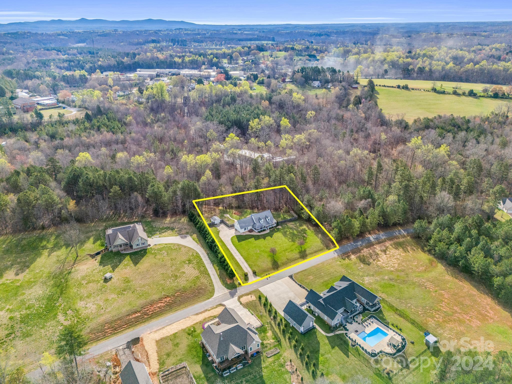 211 Brians Way Rutherfordton, NC 28139 - Photo 8 of 46 an aerial view of a house with a swimming pool