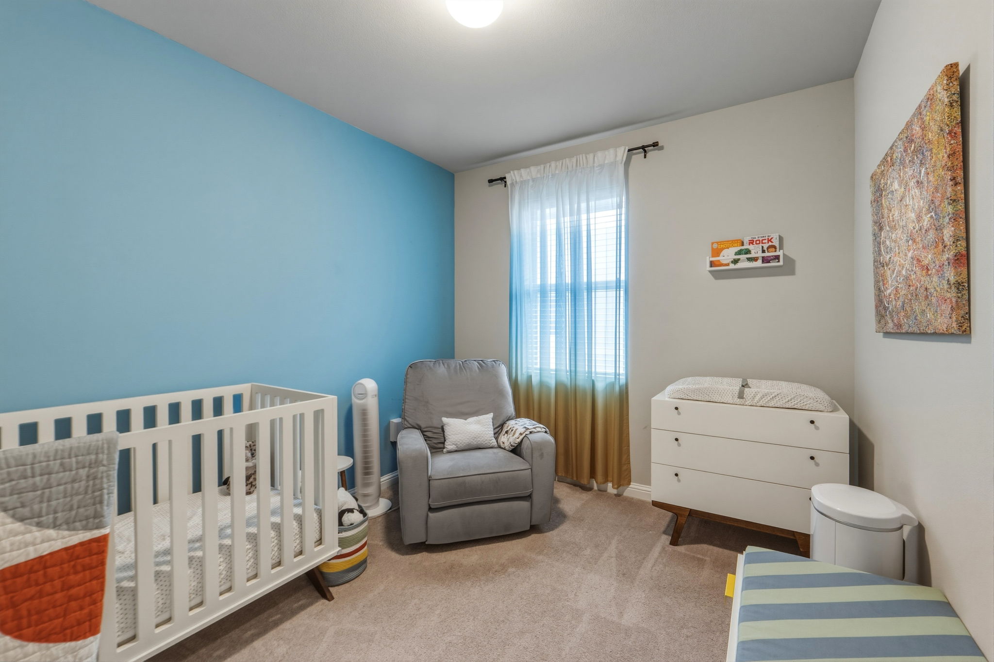 6814 East Riverside Drive, Unit 34 Austin, TX 78741 - Photo 22 of 26 a bedroom with a bed and couch