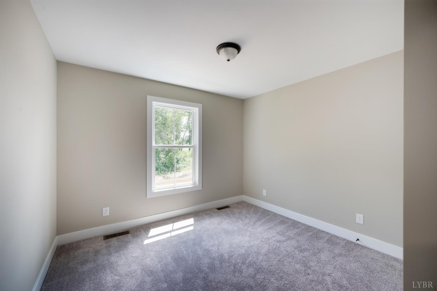 71 Luke Court Rustburg, VA 24588 - Photo 27 of 37 an empty room with windows