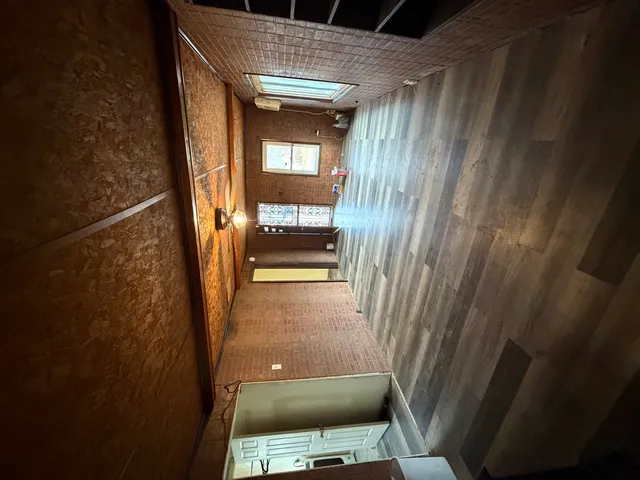 a view of storage and utility room