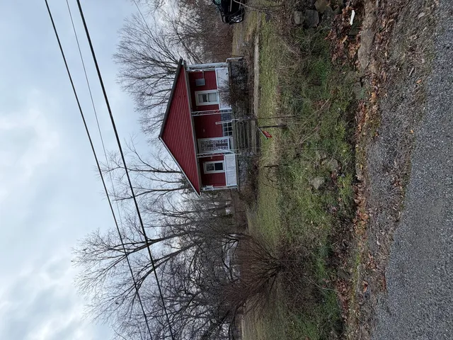 a view of a backyard of a house