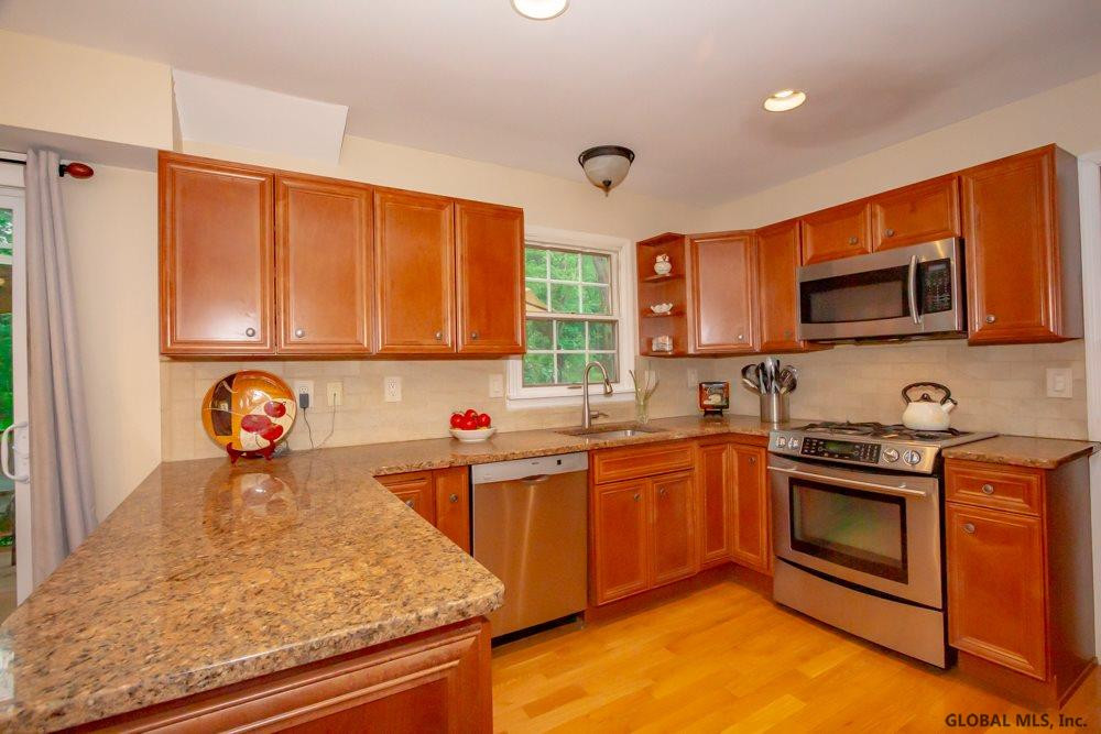 114 Font Grove Road Bethlehem, NY 12159 - Photo 19 of 56 Maple cabinetry, granite counter tops