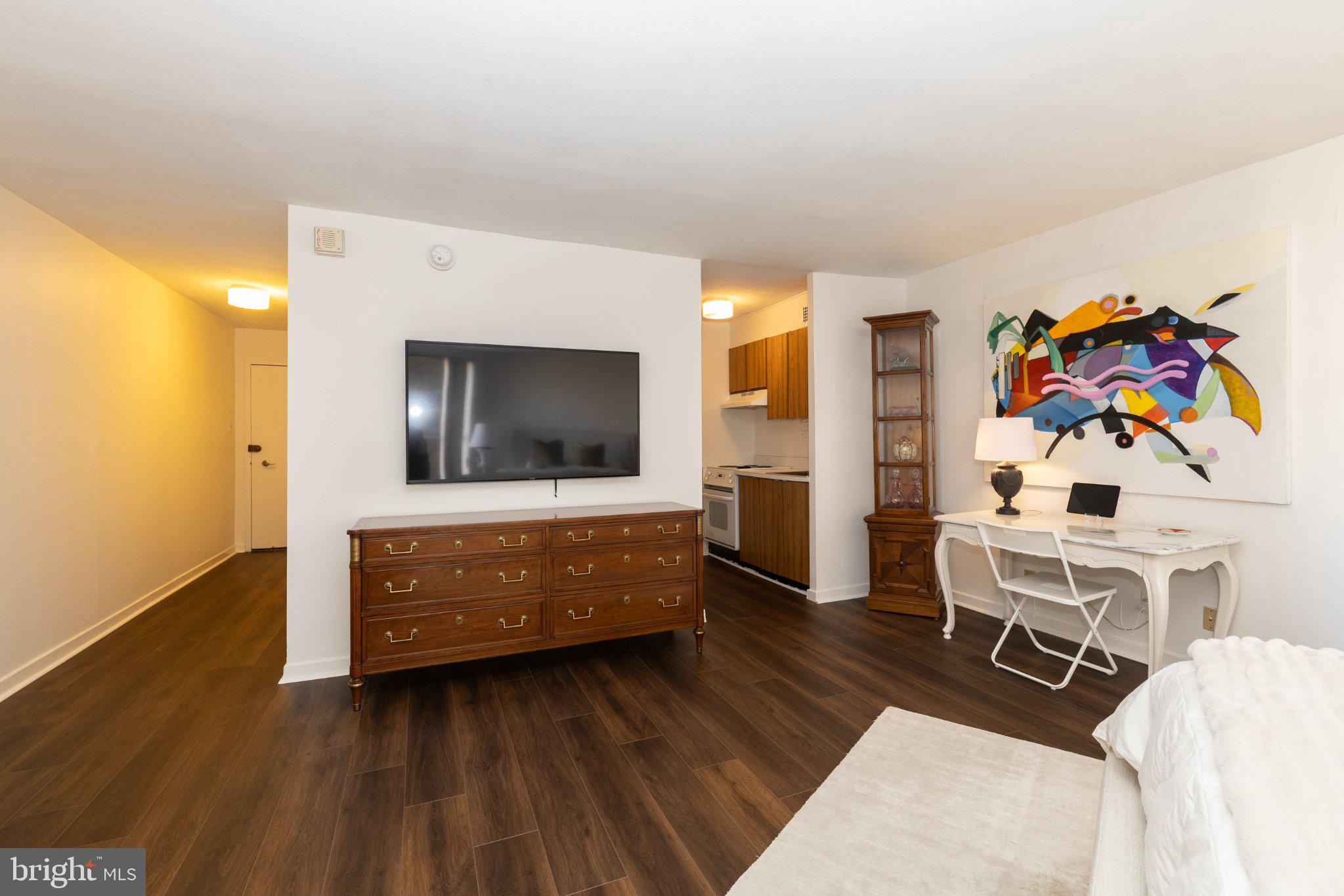 224 West Rittenhouse Square, Unit 1704 Philadelphia, PA 19103 - Photo 9 of 23 Modern living space with vibrant art.