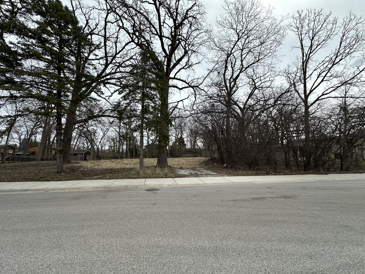 755 Kipling Place Deerfield, IL 60015 - Photo 2 of 4 a house with trees in front of it