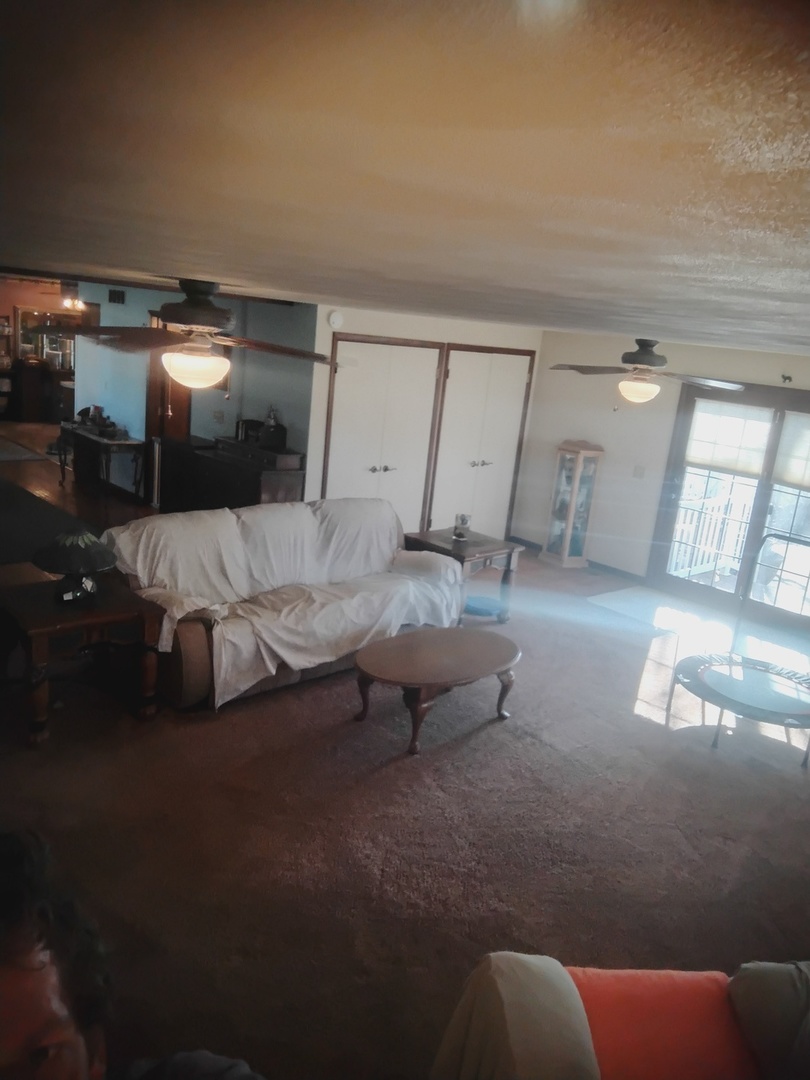 503 North Walnut Street Delavan, IL 61734 - Photo 20 of 32 a living room with furniture and a flat screen tv