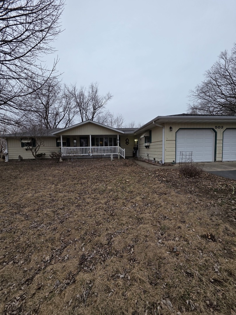 503 North Walnut Street Delavan, IL 61734 - Photo 3 of 32 a view of a house with a yard