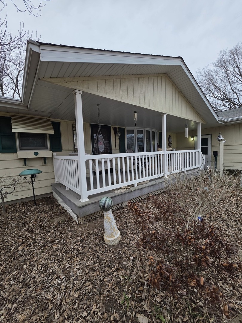 503 North Walnut Street Delavan, IL 61734 - Photo 4 of 32 a view of a house with backyard and deck