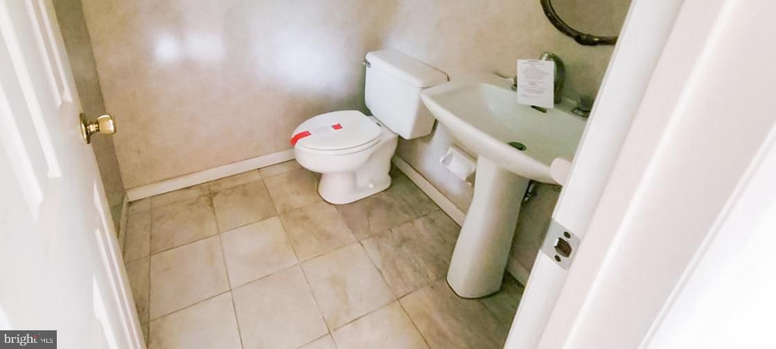 533 Pugh Road Wayne, PA 19087 - Photo 11 of 27 a bathroom with a sink and toilet