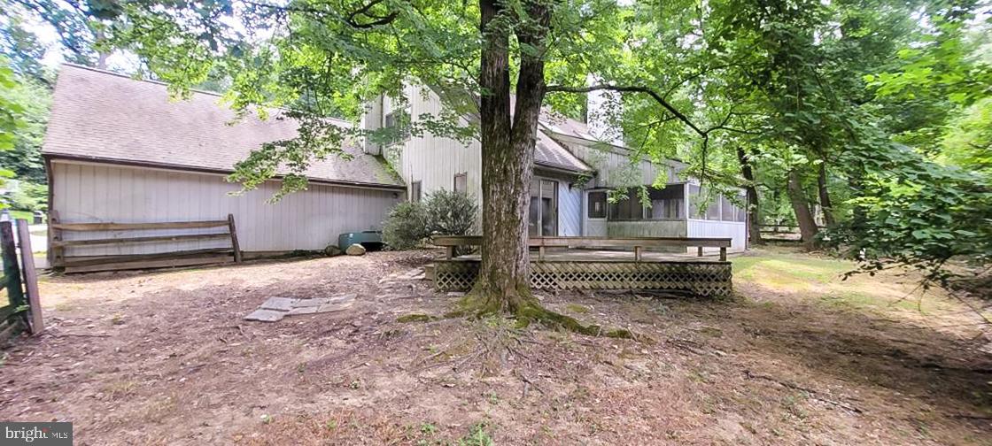533 Pugh Road Wayne, PA 19087 - Photo 27 of 27 a house with trees in front of it