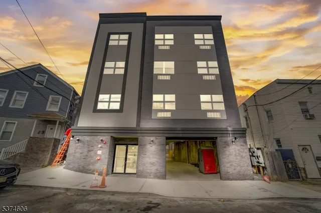 a view of a house with a street