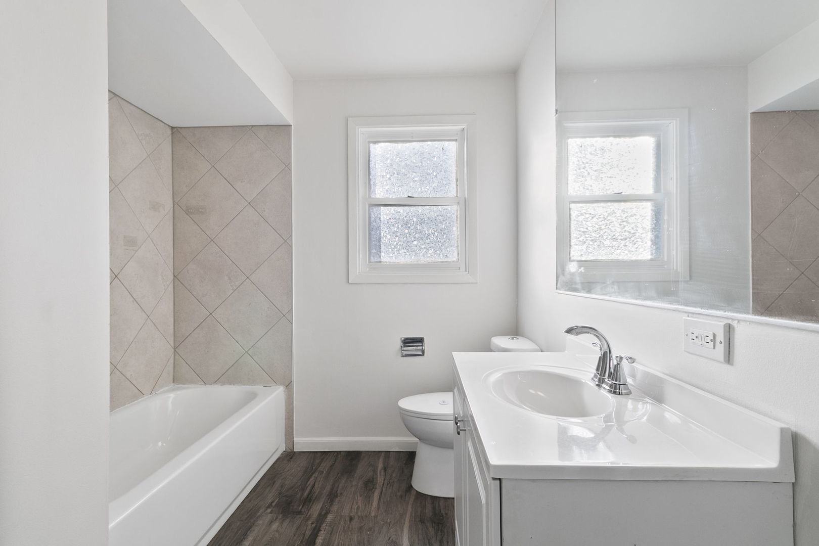 2236 West 157th Place Markham, IL 60426 - Photo 11 of 14 a bathroom with a sink a toilet and shower