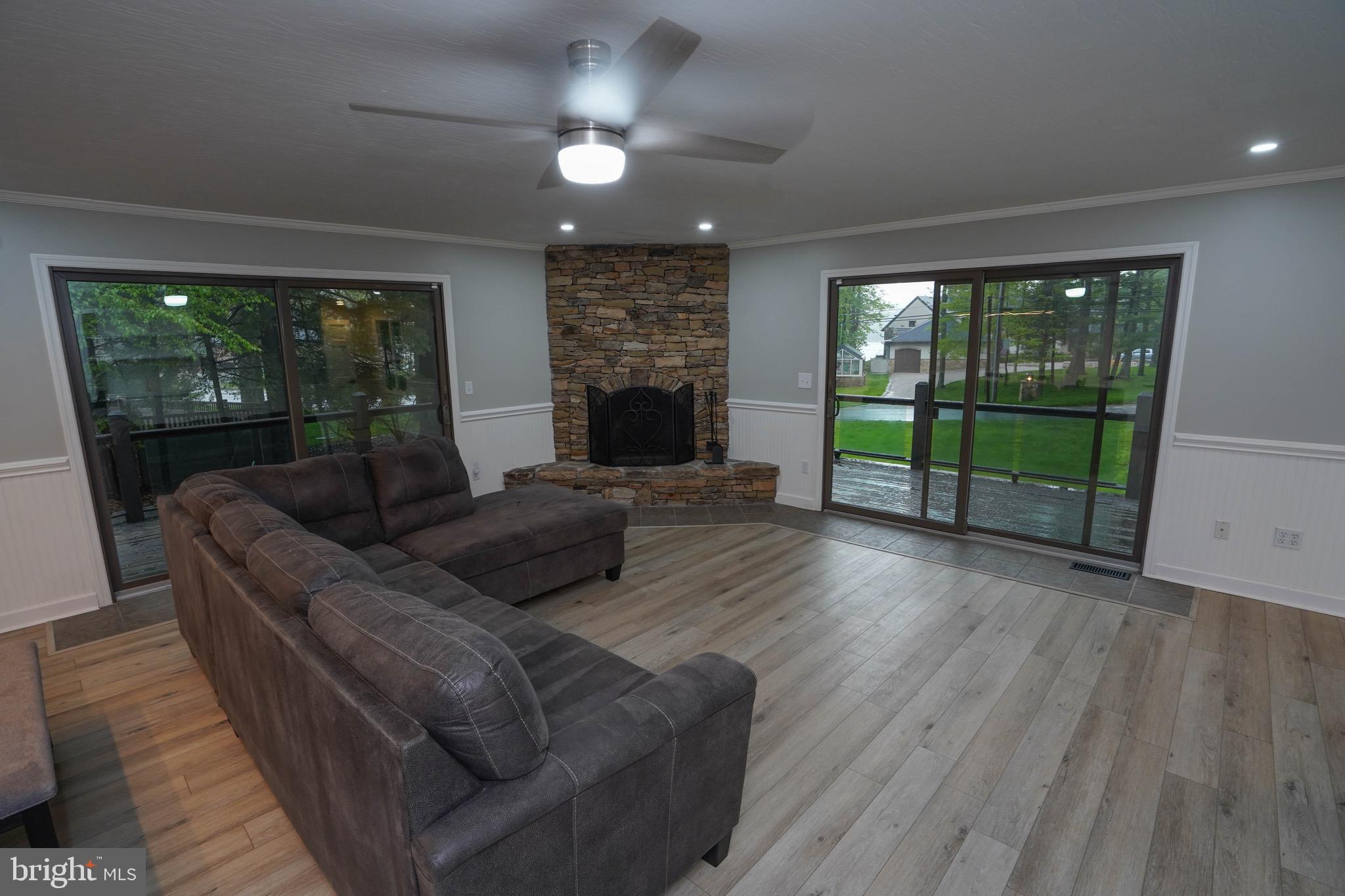 639 Beckmans Peninsula Road Swanton, MD 21561 - Photo 35 of 69 Living room with wood burning fireplace