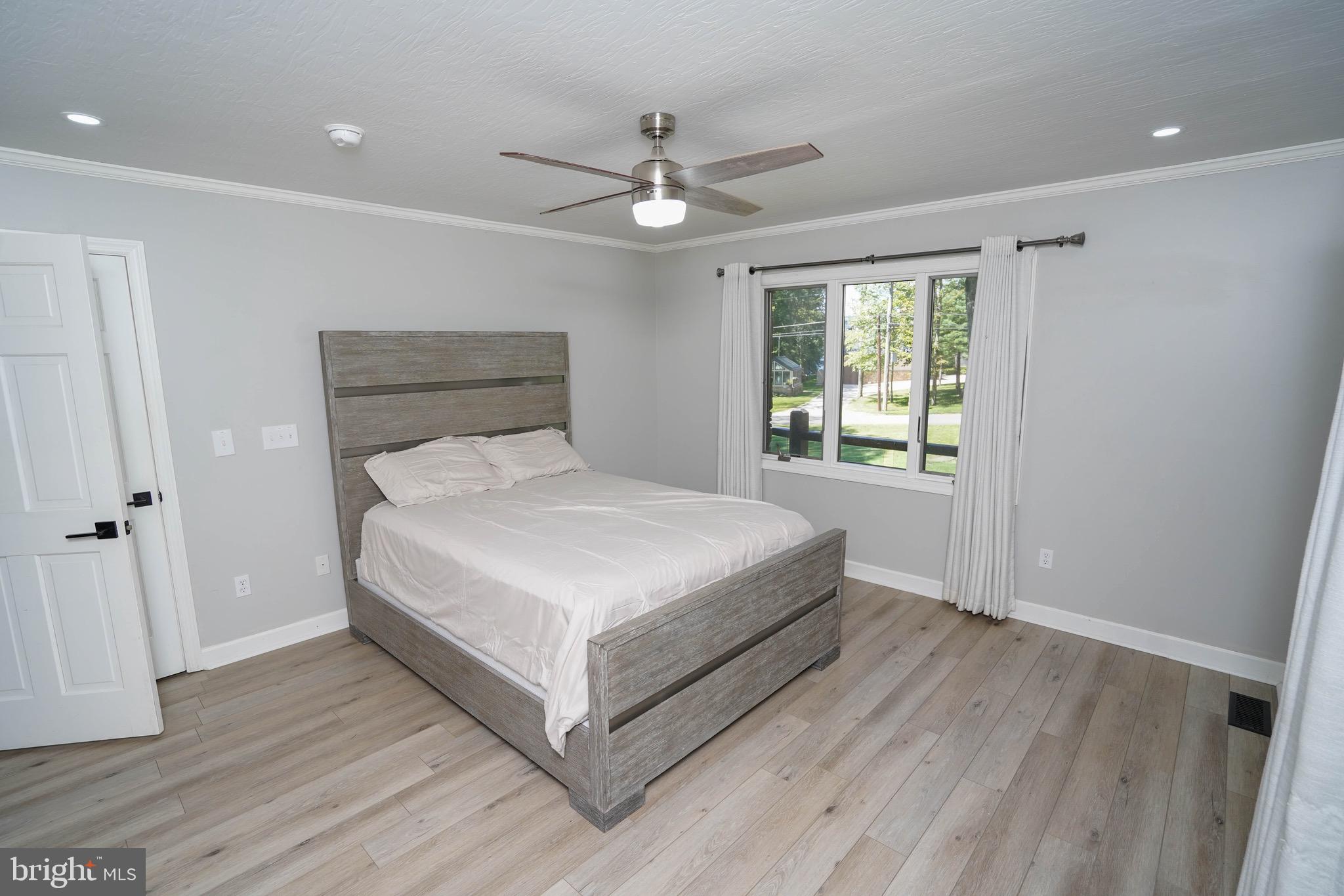 639 Beckmans Peninsula Road Swanton, MD 21561 - Photo 43 of 69 Main level master bedroom
