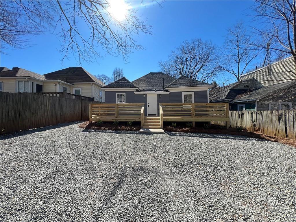 455 Lynch Avenue Northwest Atlanta, GA 30318 - Photo 3 of 11 a front view of a house with a yard