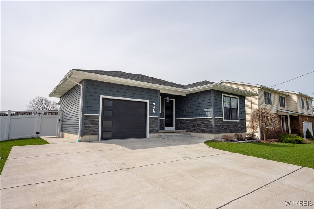 1225 Losson Road Cheektowaga, NY 14227 - Photo 3 of 47 Vinyl sided with stone accent.