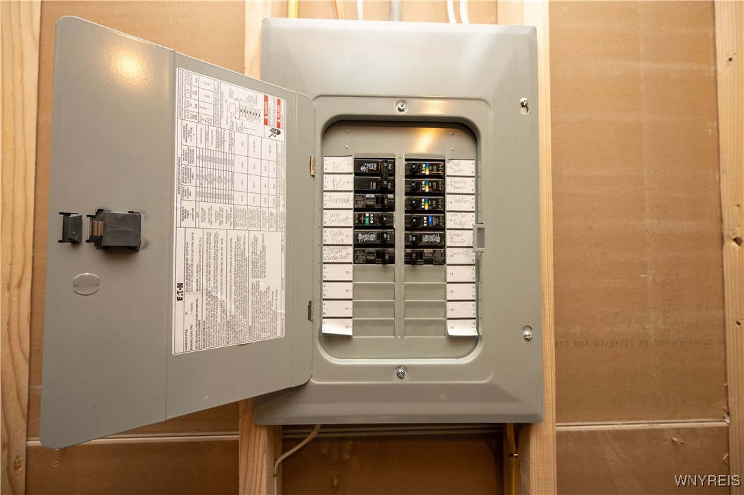 1225 Losson Road Cheektowaga, NY 14227 - Photo 35 of 47 Electric sub panel in basement. Main panel in gara