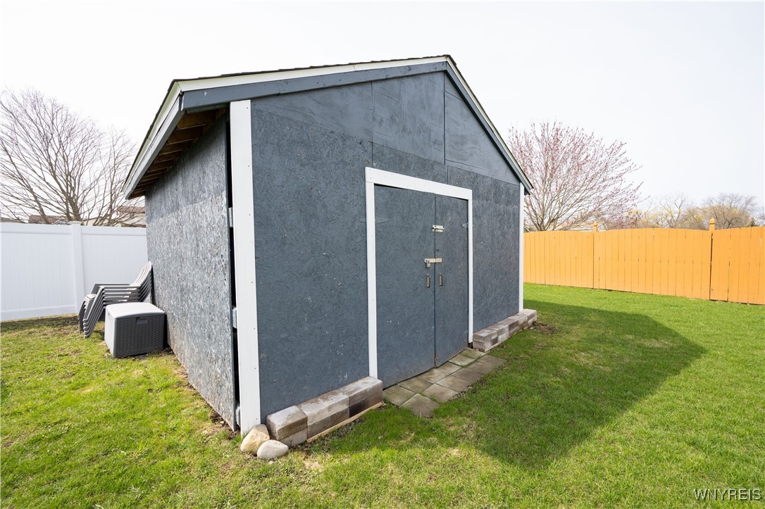 1225 Losson Road Cheektowaga, NY 14227 - Photo 43 of 47 Siding for the shed is inside and will convey with