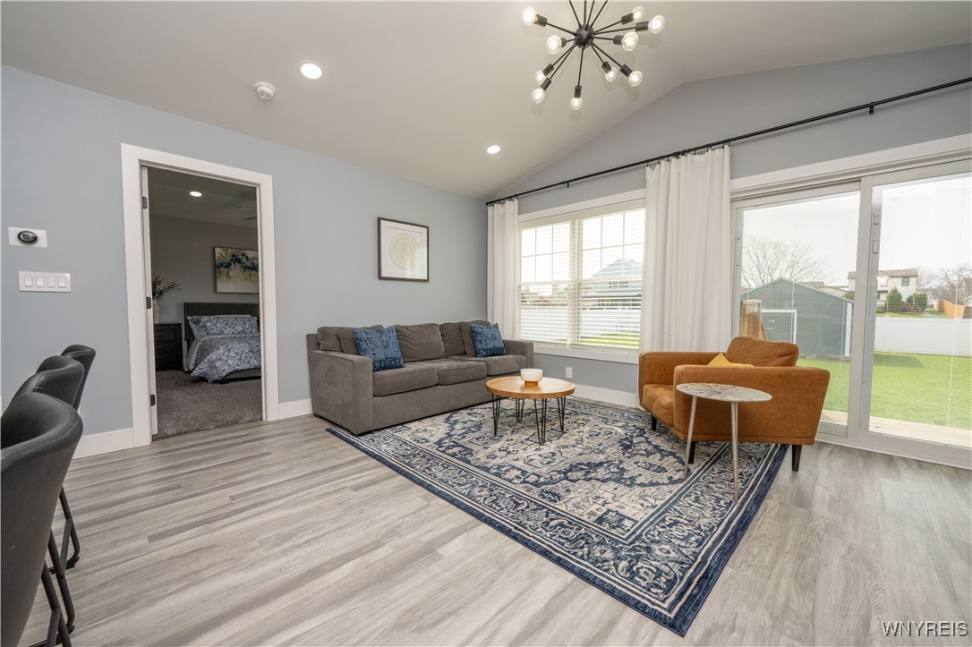 1225 Losson Road Cheektowaga, NY 14227 - Photo 9 of 47 Gas fireplace feature in living room.