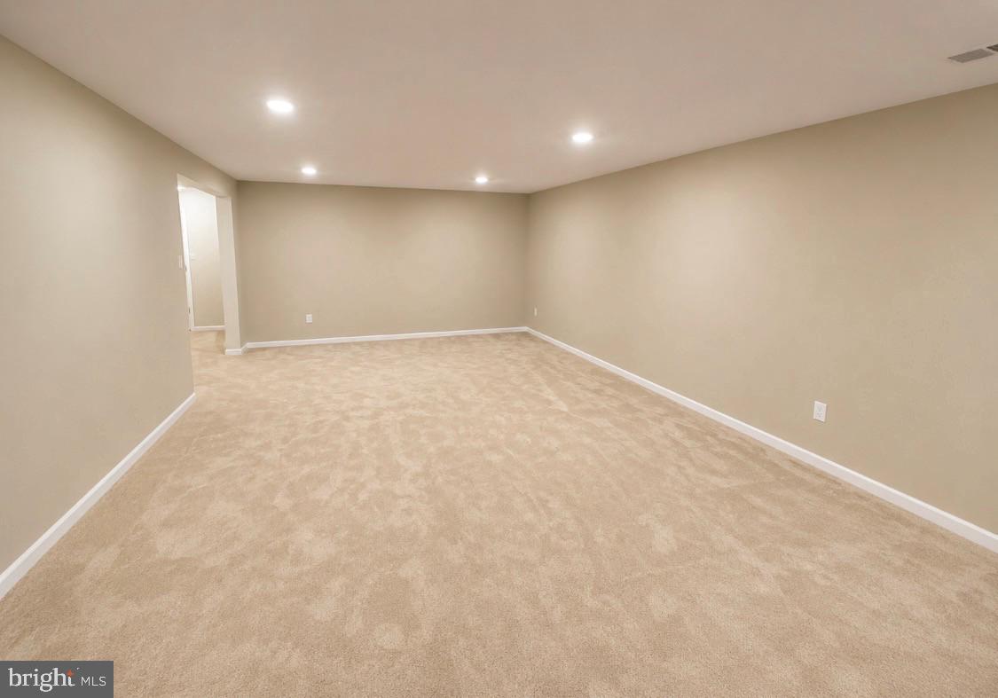 17854 Meriwether Lewis Street Ruther Glen, VA 22546 - Photo 24 of 35 an empty room with a empty space and window