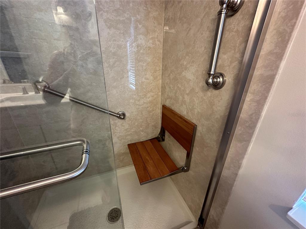 8649 Southwest 108th Ln Road Ocala, FL 34481 - Photo 30 of 72 TEAK FOLD DOWN SEAT