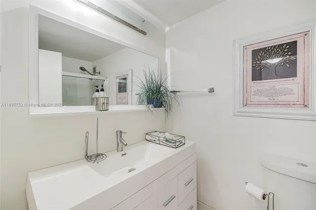 a view of a room that has a table and a table chair