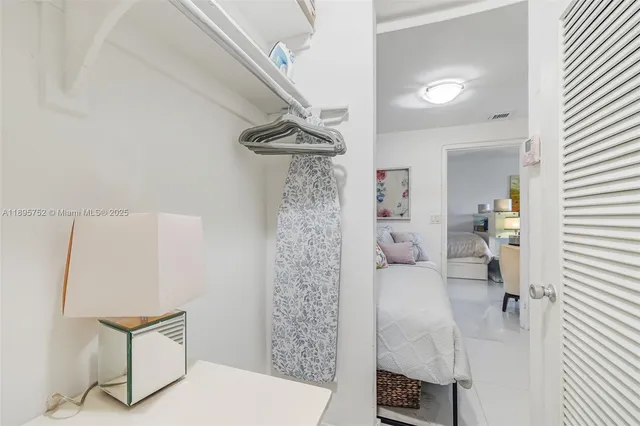 a room with lots of furniture wooden floor and a table