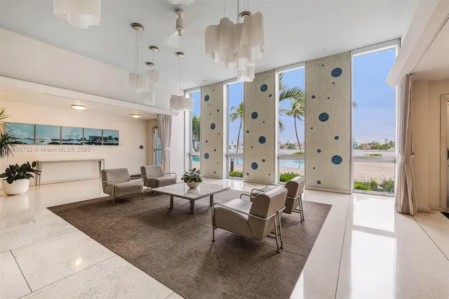 a view of swimming pool with a table and chairs