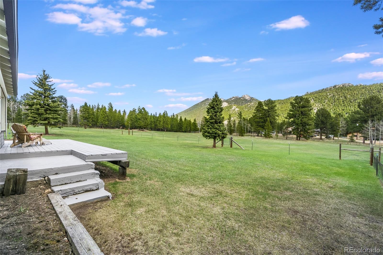 104 Mountain House Road Black Hawk, CO 80422 - Photo 26 of 32 a view of a park with large trees