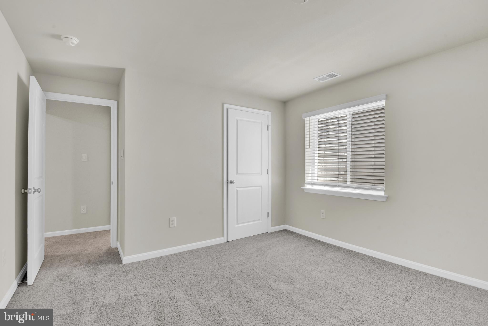 454 Hanson Street Frederick, MD 21701 - Photo 31 of 45 a view of an empty room with a window