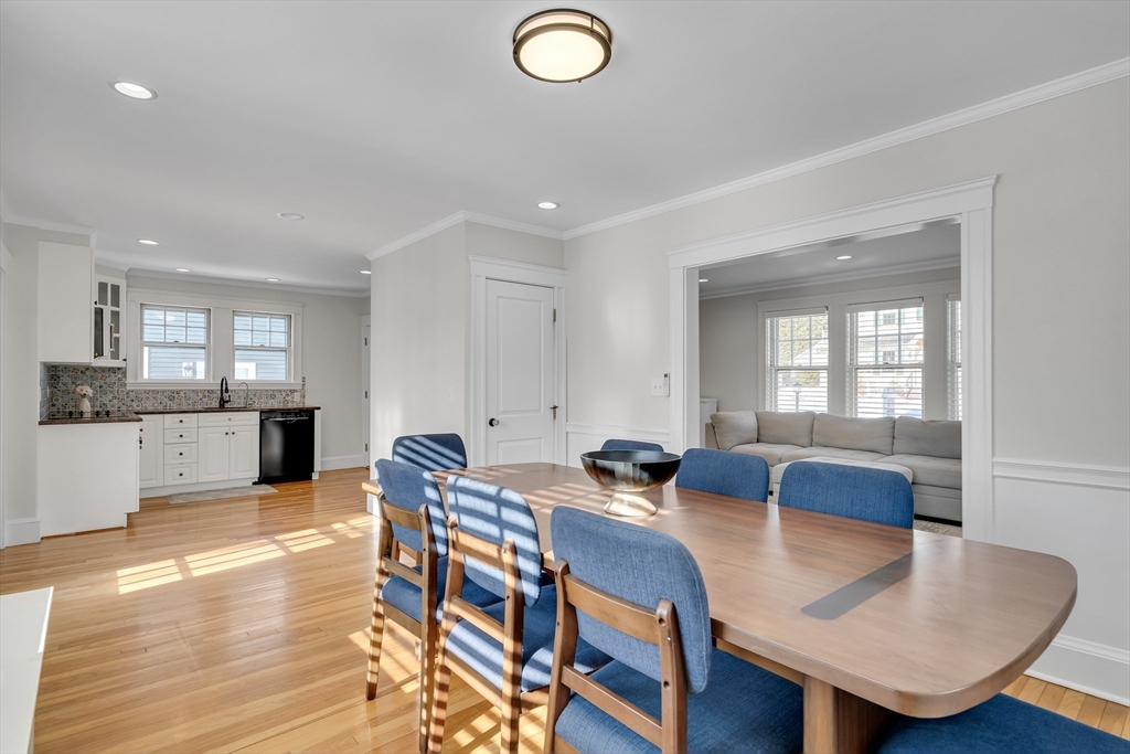 10 Dexter Road Lexington, MA 02420 - Photo 12 of 35 a view of a dining room with furniture and wooden floor