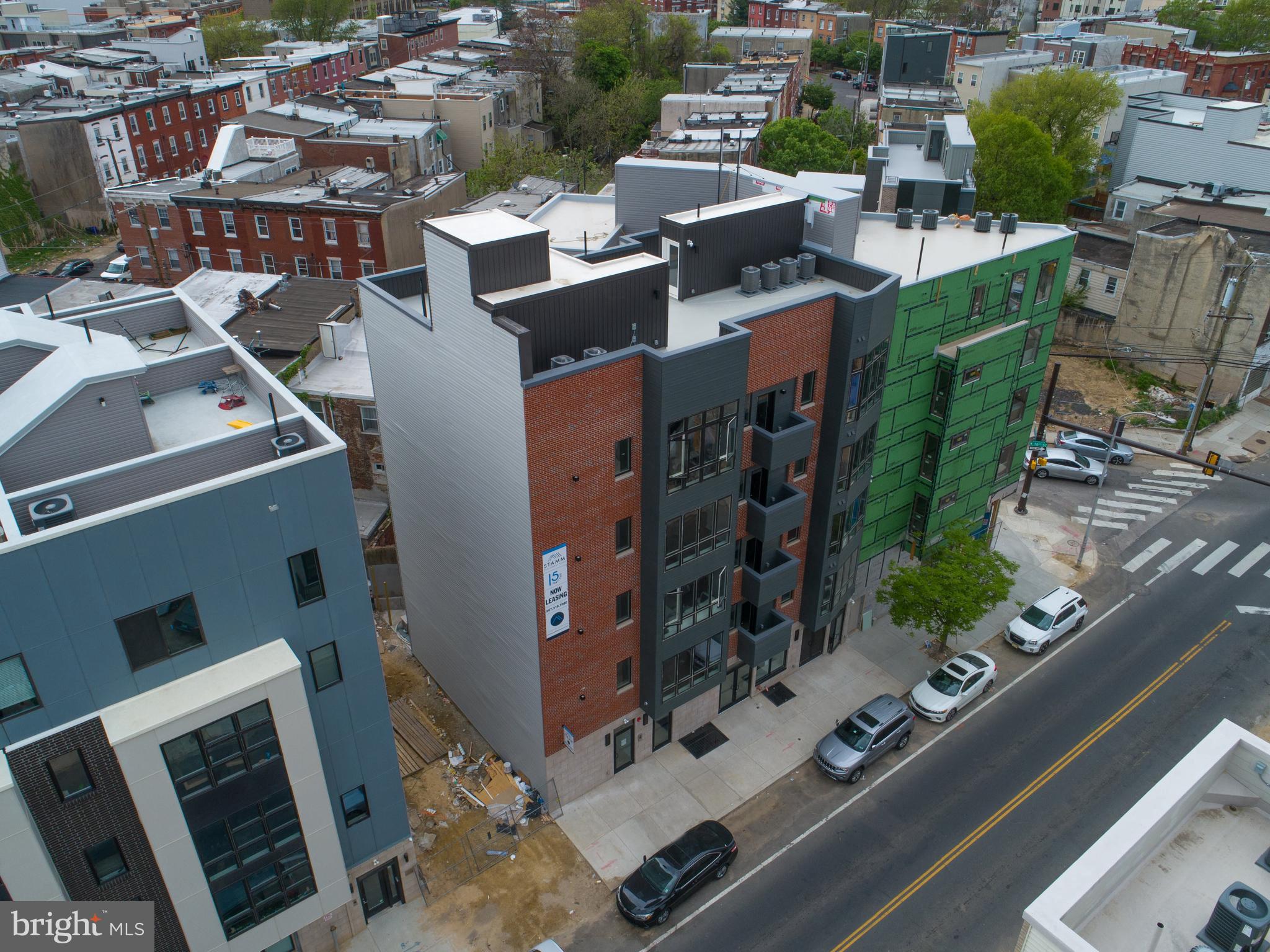 1534 Ridge Avenue, Unit 202 Philadelphia, PA 19130 - Photo 4 of 20 an aerial view of a city with lots of residential buildings