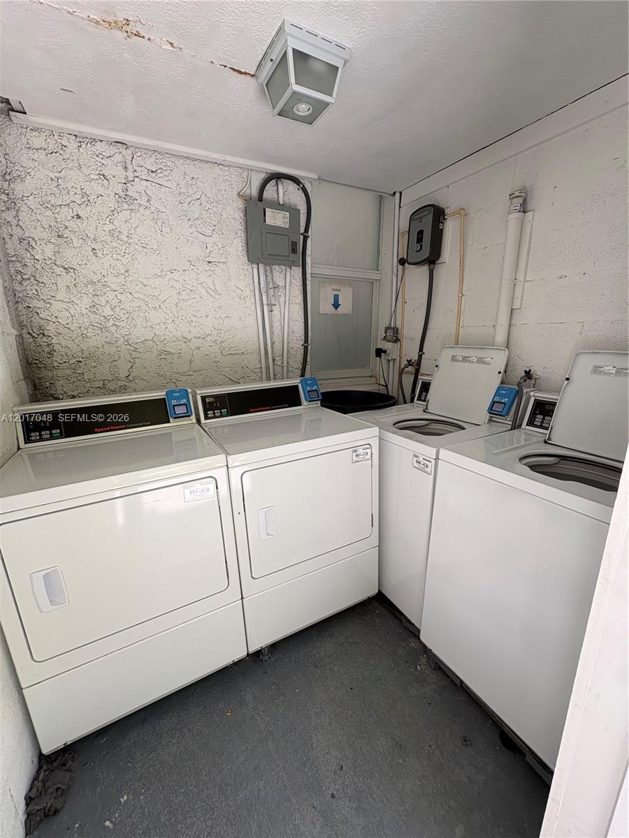 3237 Southwest 4th Street, Unit 6 Miami, FL 33135 - Photo 9 of 10 a utility room with dryer and washer