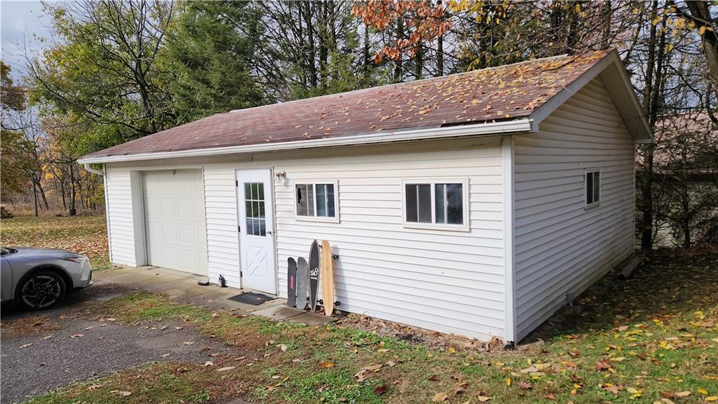 468 North Pike Road Sarver, PA 16055 - Photo 5 of 18 a view of a house with a yard and garage