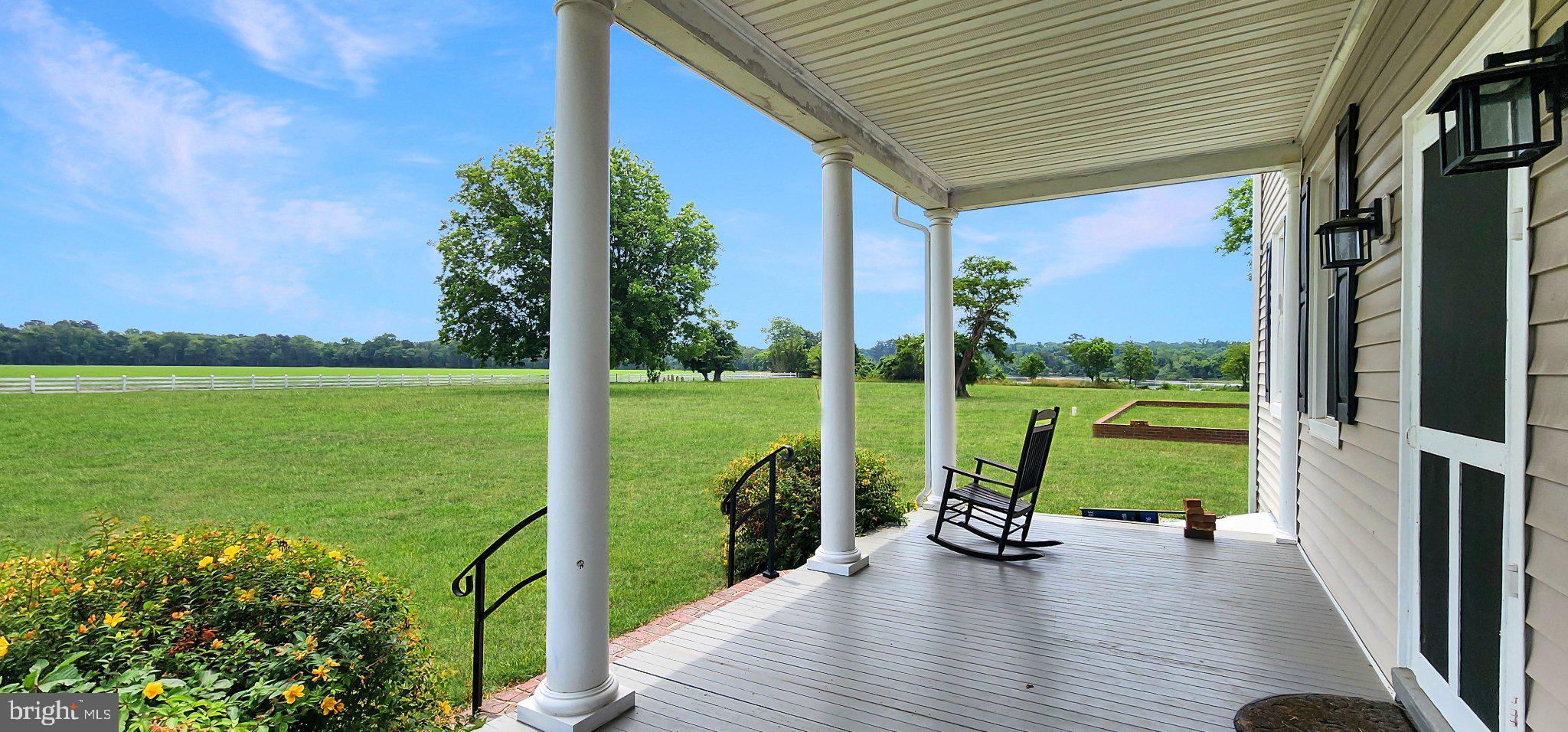 2598 Cherrystone Road Cape Charles, VA 23310 - Photo 7 of 47 Serene porch with scenic views.