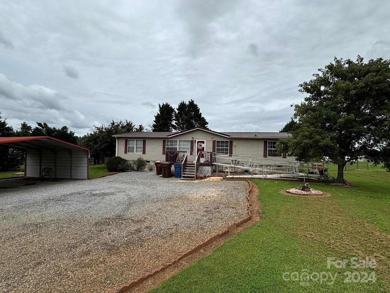 4812 Rifle Range Road Conover, NC 28613 - Photo 1 of 7 a view of a house with swimming pool and sitting area