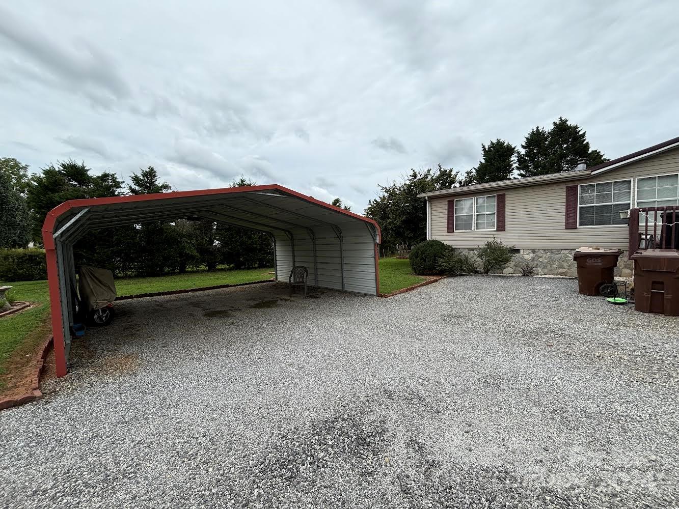 4812 Rifle Range Road Conover, NC 28613 - Photo 2 of 7 a view of house with a yard and hanging chair