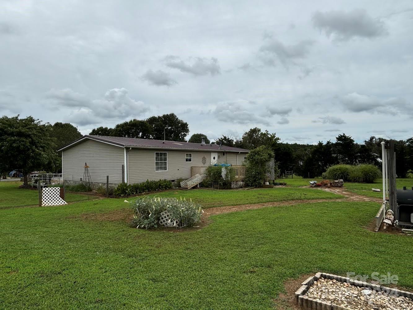 4812 Rifle Range Road Conover, NC 28613 - Photo 6 of 7 a fire hydrant in the middle of a field