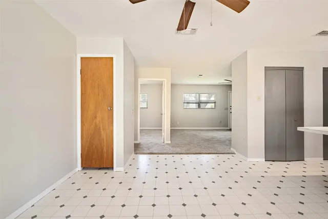 a bathroom with a shower and a sink