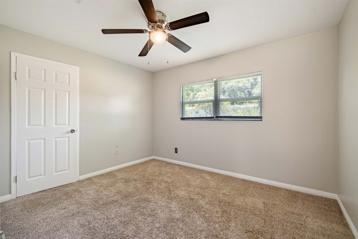 2502 Cypress Lane Cedar Park, TX 78613 - Photo 13 of 25 a view of an empty room with a window