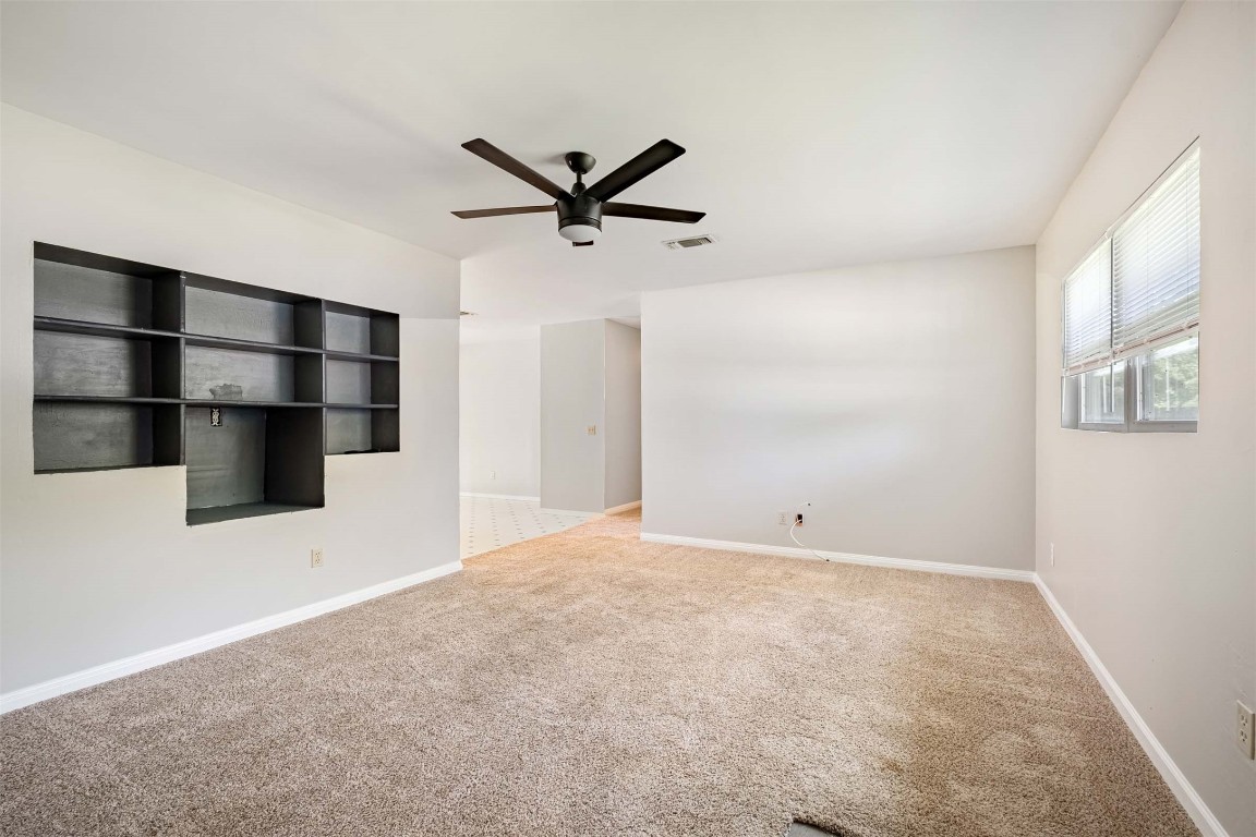 2502 Cypress Lane Cedar Park, TX 78613 - Photo 5 of 25 a view of an empty room with a cabinet