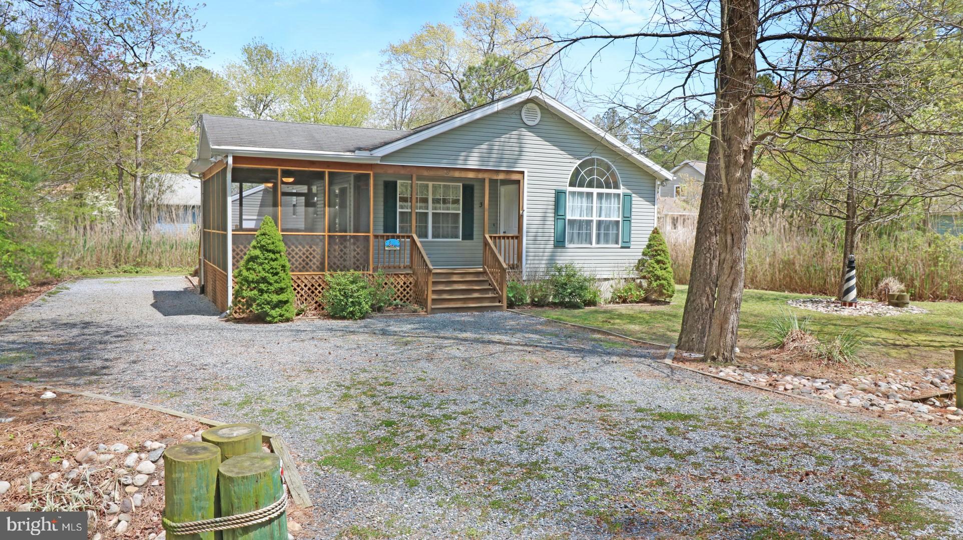 39 Gloucester Road Ocean Pines, MD 21811 - Photo 1 of 24 Spacious lot leaves room to park a boat AND cars