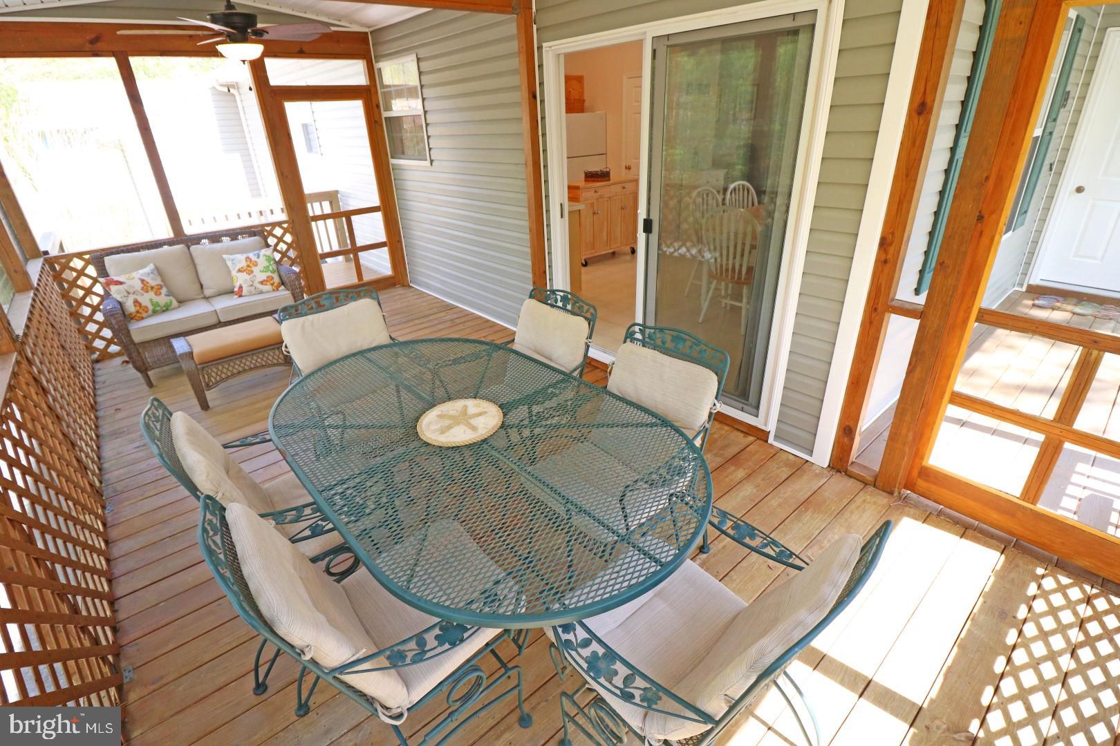 39 Gloucester Road Ocean Pines, MD 21811 - Photo 4 of 24 Livin' is Easy out on the Screened in Porch