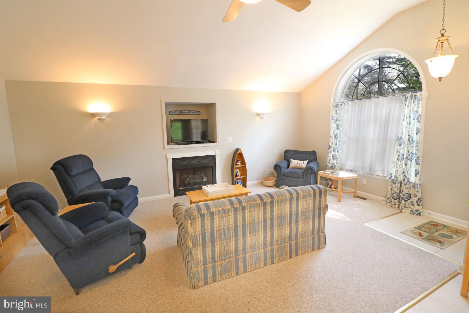 39 Gloucester Road Ocean Pines, MD 21811 - Photo 6 of 24 Open Living Area and Gas Log Fireplace w/TV Nook
