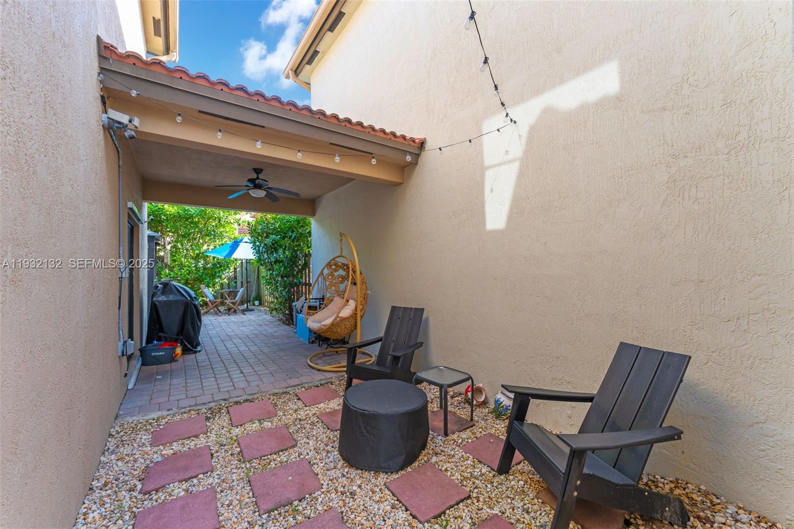 22813 Southwest 88th Path Cutler Bay, FL 33190 - Photo 16 of 24 a living room with furniture and a window