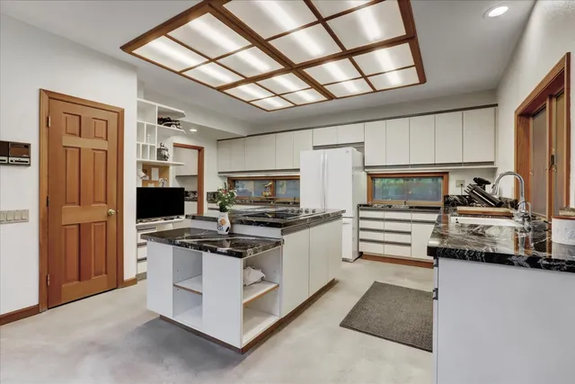 a bathroom with a tub and a shower