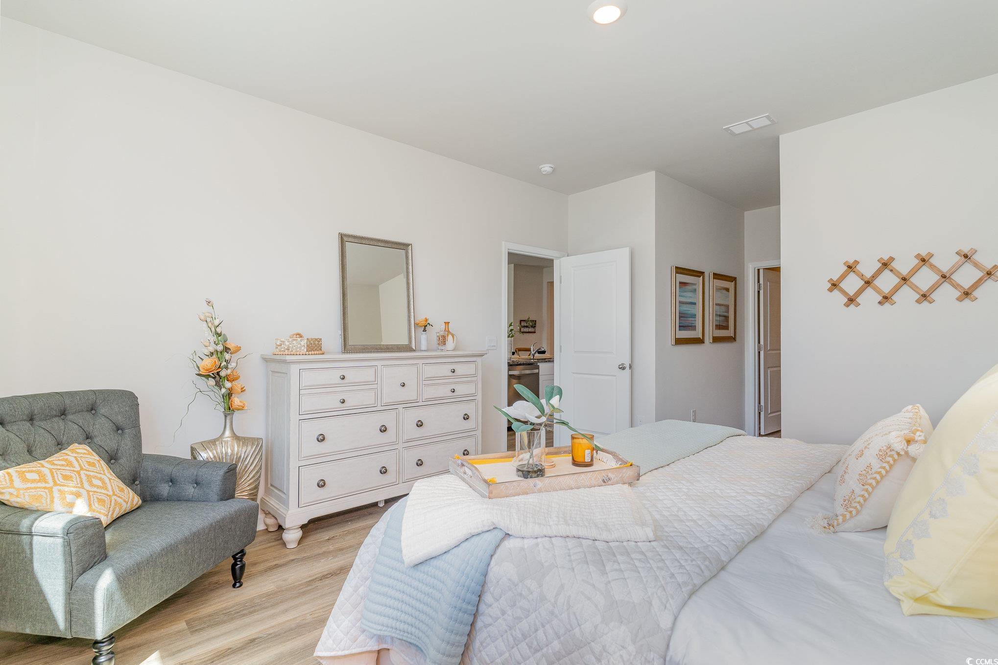 7366 Meadow Walk Loop Loris, SC 29569 - Photo 20 of 20 Bedroom with light wood-style floors