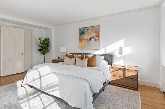 a kitchen with white cabinets